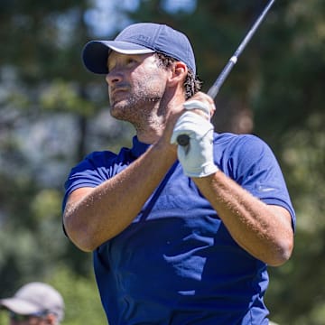 Tony Romo hits a tee shot on the 6th hole during the ACC Golf Tournament at Edgewood Tahoe Golf Course in South Lake Tahoe