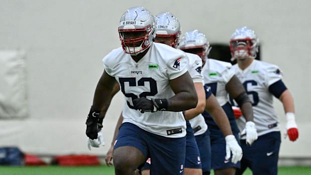 May 9, 2025; Foxborough, MA, USA; New England Patriots offensive tackle Marcus Bryant (52) practices during rookie camp at Gi