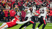 Dec 7, 2025; Kansas City, Missouri, USA; Kansas City Chiefs defensive tackle Chris Jones (95) pressures Houston Texans quarterback C.J. Stroud (7) during the second quarter at GEHA Field at Arrowhead Stadium. Mandatory Credit: Denny Medley-Imagn Images