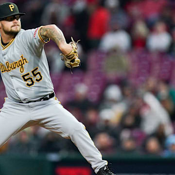 Pittsburgh Pirates pitcher Chase Shugart (55) throws a pitch in the sixth inning of a MLB game between the Cincinnati Reds and Pittsburgh Pirates, Friday, April 11, 2025, at Great American Ball Park in Downtown Cincinnati. Reds won 5-3.