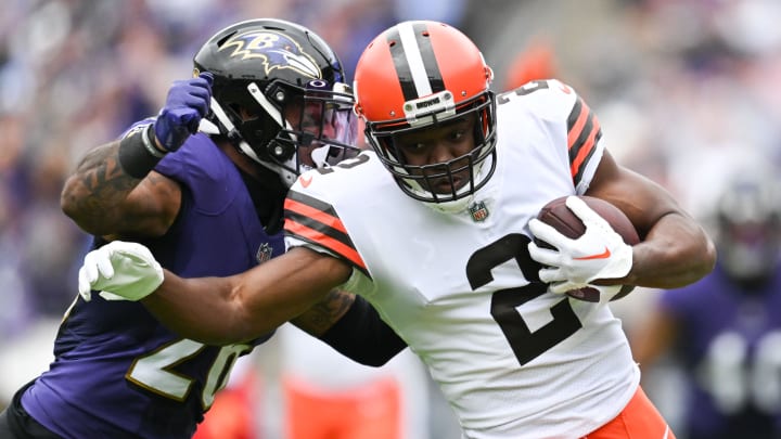 Oct 23, 2022; Baltimore, Maryland, USA;  Cleveland Browns wide receiver Amari Cooper (2) runs as Baltimore Ravens safety Geno Stone (26) attempts to tackle during the first half at M&T Bank Stadium. Mandatory Credit: Tommy Gilligan-USA TODAY Sports