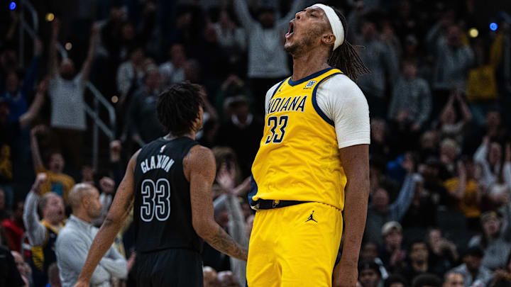 Mar 20, 2025; Indianapolis, Indiana, USA; Indiana Pacers center Myles Turner (33) celebrates a basket in the game against the Brooklyn Nets at Gainbridge Fieldhouse. Mandatory Credit: Trevor Ruszkowski-Imagn Images