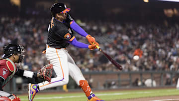 May 13, 2025; San Francisco, California, USA; San Francisco Giants shortstop Willy Adames (2) hits a two-run home run against the Arizona Diamondbacks during the fifth inning at Oracle Park.