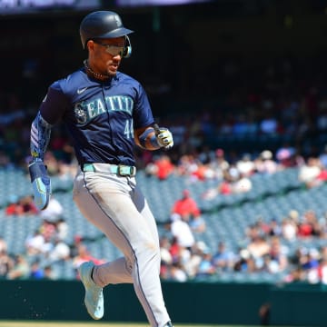 Seattle Mariners center fielder Julio Rodriguez reaches third against the Los Angeles Angels on July 14 at Angel Stadium.