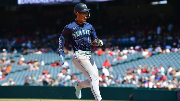 Seattle Mariners center fielder Julio Rodriguez reaches third against the Los Angeles Angels on July 14 at Angel Stadium.