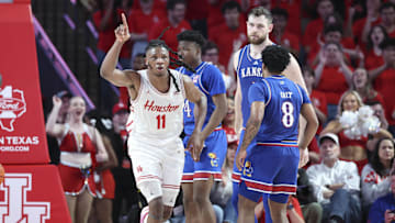 Mar 3, 2025; Houston, Texas, USA; Houston Cougars forward Joseph Tugler (11) reacts after scoring a basket during the first half against the Kansas Jayhawks at Fertitta Center. Mandatory Credit: Troy Taormina-Imagn Images