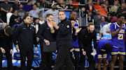Head coach Will Wade of the McNeese State Cowboys celebrates against the Clemson Tigers during the second half in the first round of the NCAA Men's Basketball Tournament at Amica Mutual Pavillion on March 20, 2025 in Providence, Rhode Island. 