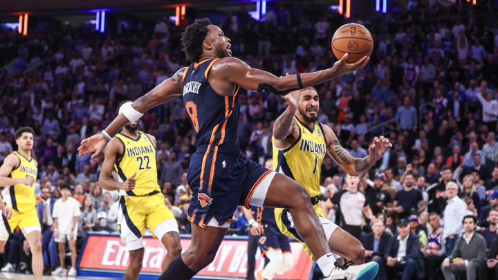 May 8, 2024; New York, New York, USA; New York Knicks forward OG Anunoby (8) drives past Indiana Pacers forward Obi Toppin (1) in the third quarter during game two of the second round for the 2024 NBA playoffs at Madison Square Garden. Mandatory Credit: Wendell Cruz-USA TODAY Sports