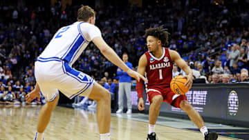 Mar 29, 2025; Newark, NJ, USA; Alabama Crimson Tide guard Mark Sears (1) handles the ball against Duke Blue Devils forward Cooper Flagg (2) during the second half in the East Regional final of the 2025 NCAA tournament at Prudential Center. Mandatory Credit: Vincent Carchietta-Imagn Images