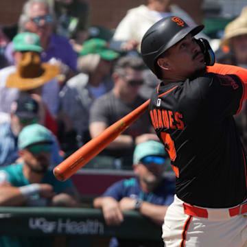 Mar 15, 2025; Scottsdale, Arizona, USA; San Francisco Giants shortstop Willy Adames (2) hits against the Seattle Mariners in the first inning at Scottsdale Stadium. 