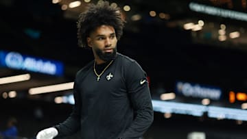 New Orleans Saints wide receiver Chris Olave warms up before facing the New England Patriots on Oct. 12, 2025.