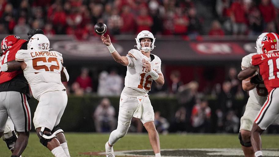 Texas quarterback Arch Manning throws a pass against Georgia.
