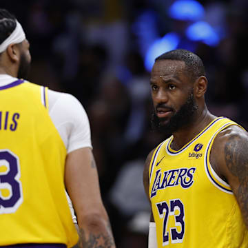 Apr 3, 2024; Washington, District of Columbia, USA; Los Angeles Lakers forward LeBron James (23) talks with Lakers forward Anthony Davis (3) against the Washington Wizards at Capital One Arena. Mandatory Credit: Geoff Burke-Imagn Images