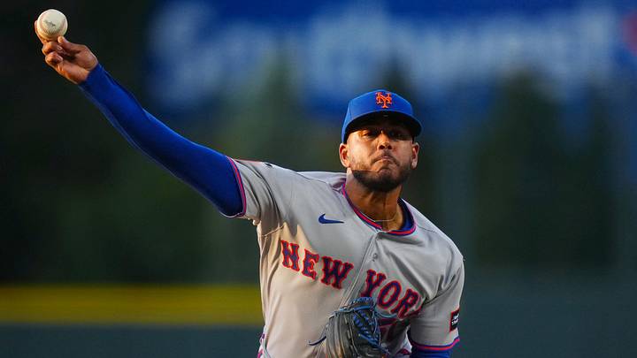 May 6, 2026; Denver, Colorado, USA; New York Mets starting pitcher Freddy Peralta (51) delivers a pitch against the Colorado Rockies in the first inning at Coors Field. Mandatory Credit: Ron Chenoy-Imagn Images
