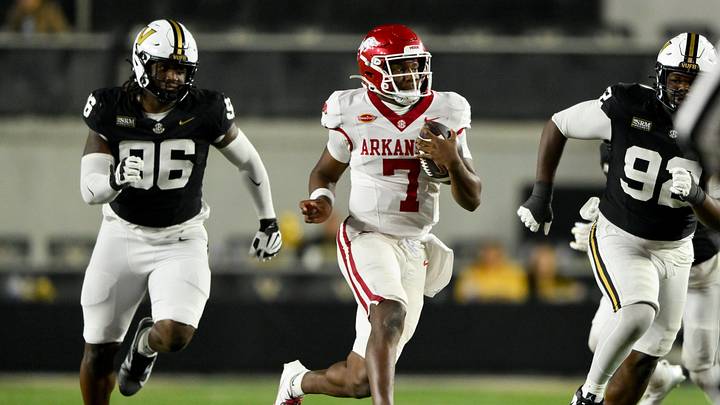 Oct 17, 2026; Nashville, Tennessee, USA;  Arkansas Razorbacks quarterback KJ Jackson (7) runs with the ball against the Vanderbilt Commodores during the second half at FirstBank Stadium.  Mandatory Credit: Steve Roberts-Imagn Images