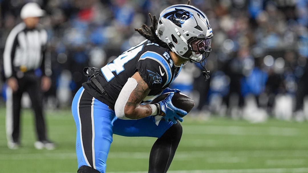 Dec 1, 2024; Charlotte, North Carolina, USA; Carolina Panthers running back Jonathon Brooks (24) runs for yardage against the Tampa Bay Buccaneers during the second half at Bank of America Stadium. Mandatory Credit: Jim Dedmon-Imagn Images