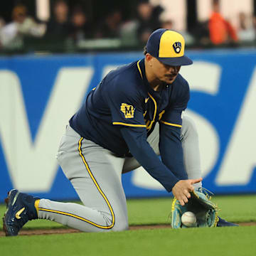 Sep 12, 2024; San Francisco, California, USA; Milwaukee Brewers shortstop Willy Adames (27) gathers the ball against the San Francisco Giants during the second inning at Oracle Park. Mandatory Credit: Kelley L Cox-Imagn Images