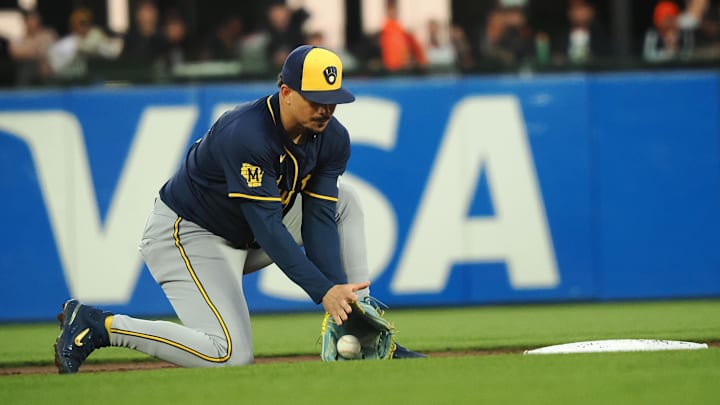 Sep 12, 2024; San Francisco, California, USA; Milwaukee Brewers shortstop Willy Adames (27) gathers the ball against the San Francisco Giants during the second inning at Oracle Park. Mandatory Credit: Kelley L Cox-Imagn Images