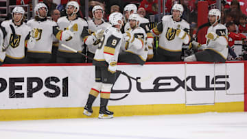Mar 28, 2025; Chicago, Illinois, USA; Vegas Golden Knights center Jack Eichel (9) high-fives teammates after a second period Vegas Golden Knights goal against the Chicago Blackhawks at United Center. Mandatory Credit: Talia Sprague-Imagn Images