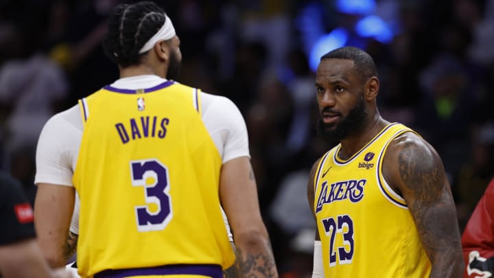 Apr 3, 2024; Washington, District of Columbia, USA; Los Angeles Lakers forward LeBron James (23) talks with Lakers forward Anthony Davis (3) against the Washington Wizards at Capital One Arena. Mandatory Credit: Geoff Burke-USA TODAY Sports