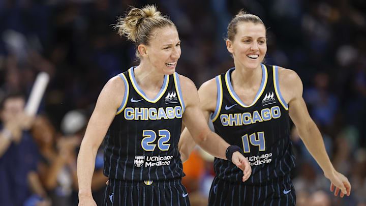 Aug 20, 2022; Chicago, Illinois, USA; Chicago Sky guard Courtney Vandersloot (22) celebrates with guard Allie Quigley (14) during the second half of Game 2 of the first round of the WNBA playoffs against the New York Liberty at Wintrust Arena. Mandatory Credit: Kamil Krzaczynski-Imagn Images