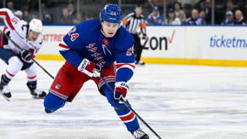 Apr 23, 2024; New York, New York, USA;  New York Rangers right wing Kaapo Kakko (24) skates across the blue line against the Washington Capitals during the third period in game two of the first round of the 2024 Stanley Cup Playoffs at Madison Square Garden. Mandatory Credit: Dennis Schneidler-USA TODAY Sports