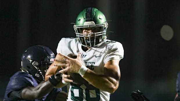 The Naples Golden Eagles compete against the Venice Indians in a spring football game at Staver Field in Naples, Fla., on Tue