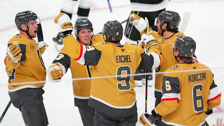 Oct 8, 2025; Las Vegas, Nevada, USA; Vegas Golden Knights right wing Mitch Marner (93) celebrates with Vegas Golden Knights center Jack Eichel (9), after assisting on a goal scored by Eichel against the Los Angeles Kings during the third period at T-Mobile Arena. Mandatory Credit: Stephen R. Sylvanie-Imagn Images