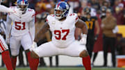 Nov 19, 2023; Landover, Maryland, USA; New York Giants defensive tackle Dexter Lawrence II (97) celebrates after a sack against the Washington Commanders during the second quarter at FedExField. 