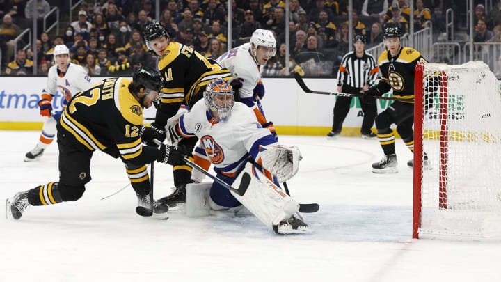 Mar 26, 2022; Boston, Massachusetts, USA; Boston Bruins center Craig Smith (12) scores on New York