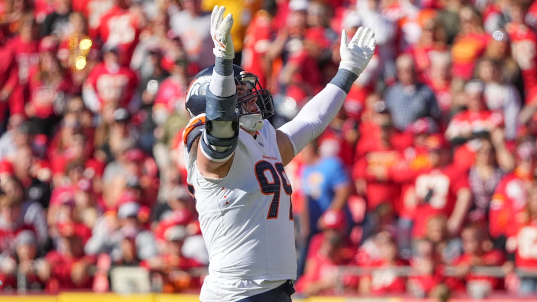 Nov 10, 2024; Kansas City, Missouri, USA; Denver Broncos defensive end Zach Allen (99) celebrates after a play against the Kansas City Chiefs during the game at GEHA Field at Arrowhead Stadium. Nov 10, 2024; Kansas City, Missouri, USA; Denver Broncos defensive end Zach Allen (99) celebrates after a play against the Kansas City Chiefs during the game at GEHA Field at Arrowhead Stadium.