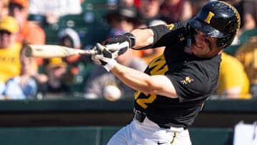 Iowa's Reese Moore bats during game 2 of Iowa vs. Oregon State baseball at Principal Park on May 10, 2025, in Des Moines.