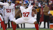 Nov 19, 2023; Landover, Maryland, USA; New York Giants defensive tackle Dexter Lawrence II (97) celebrates after a sack against the Washington Commanders during the second quarter at FedExField.