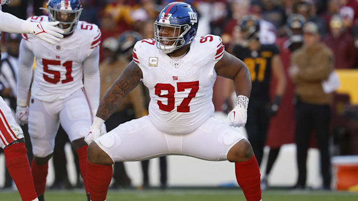 Nov 19, 2023; Landover, Maryland, USA; New York Giants defensive tackle Dexter Lawrence II (97) celebrates after a sack against the Washington Commanders during the second quarter at FedExField.