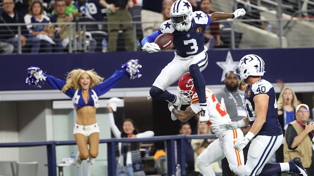 Nov 27, 2025; Arlington, Texas, USA; Dallas Cowboys wide receiver George Pickens (3) hurdles Kansas City Chiefs cornerback Trent McDuffie (22) during the fourth quarter at AT&T Stadium. Mandatory Credit: Kevin Jairaj-Imagn Images