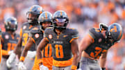 Tennessee defensive back Colton Hood (8) and the Tennessee defense celebrate after a play stopping the New Mexico State offense in an NCAA college football game on November 15, 2025, in Knoxville, Tenn.