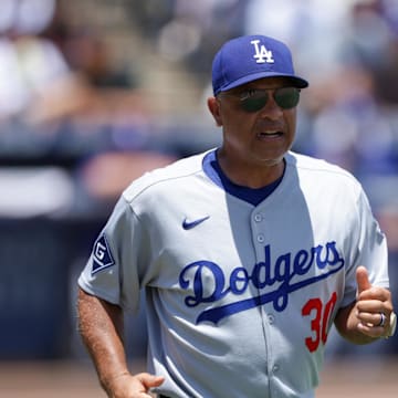 Aug 3, 2025; Tampa, Florida, USA; Los Angeles Dodgers manager Dave Roberts (30) comes out of the dugout against the Tampa Bay Rays in the fifth inning at George M. Steinbrenner Field. Mandatory Credit: Nathan Ray Seebeck-Imagn Images