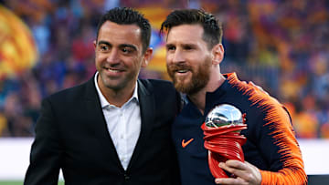 Xavi mit Messi
