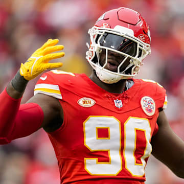 Dec 25, 2023; Kansas City, Missouri, USA; Kansas City Chiefs defensive end Charles Omenihu (90) rallies the crowd during the second half against the Las Vegas Raiders at GEHA Field at Arrowhead Stadium. Mandatory Credit: Jay Biggerstaff-Imagn Images