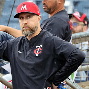 Feb 24, 2025; Port Charlotte, Florida, USA; Minnesota Twins manager Rocco Baldelli (5) looks on during a game against the Tampa Bay Rays at Charlotte Sports Park.