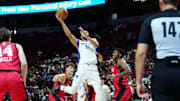 Jul 14, 2024; Las Vegas, NV, USA; Golden State Warriors forward Kevin Knox II (31) shoots against the Chicago Bulls during the third quarter at Thomas & Mack Center. Mandatory Credit: Stephen R. Sylvanie-Imagn Images