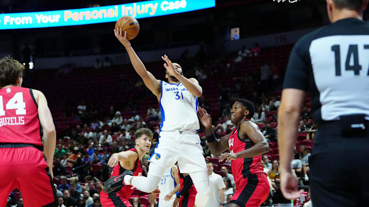 Jul 14, 2024; Las Vegas, NV, USA; Golden State Warriors forward Kevin Knox II (31) shoots against the Chicago Bulls during the third quarter at Thomas & Mack Center. Mandatory Credit: Stephen R. Sylvanie-Imagn Images