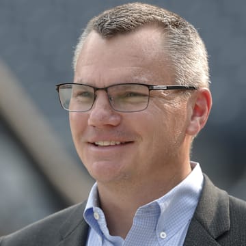 Jun 6, 2023; Pittsburgh, Pennsylvania, USA;  Pittsburgh Pirates general manager Ben Cherington looks on during batting practice before the Pirates play the Oakland Athletics at PNC Park. Mandatory Credit: Charles LeClaire-Imagn Images