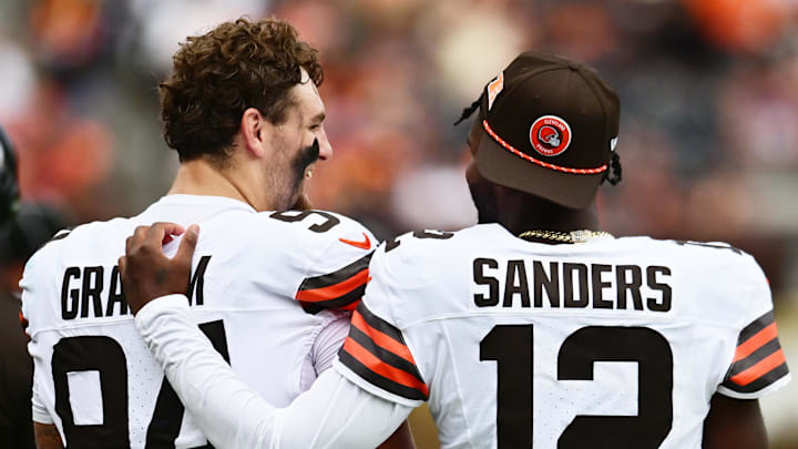 Cleveland Browns defensive tackle Mason Graham with quarterback Shedeur Sanders