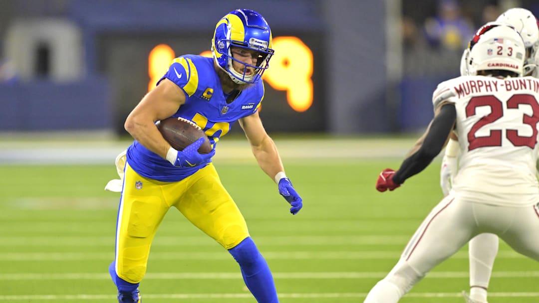 Dec 28, 2024; Inglewood, California, USA;   Los Angeles Rams wide receiver Cooper Kupp (10) ains 10 yards on a pass play before he is stopped by Arizona Cardinals cornerback Sean Murphy-Bunting (23) in the first half at SoFi Stadium. Mandatory Credit: Jayne Kamin-Oncea-Imagn Images