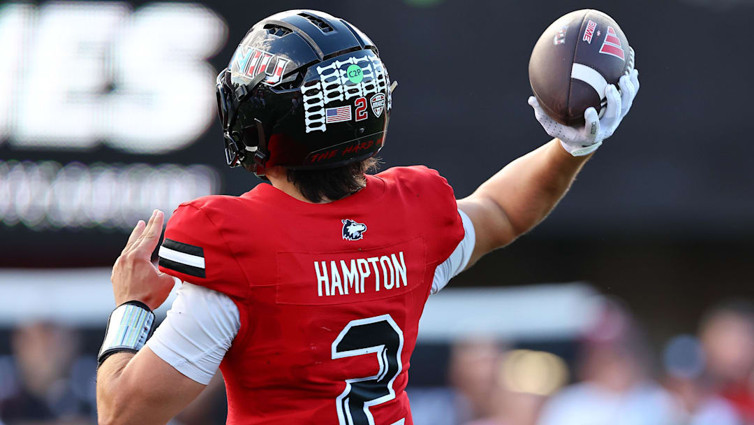 Sep 21, 2024; DeKalb, Illinois, USA; Northern Illinois Huskies quarterback Ethan Hampton (2) drops back to pass against the Buffalo Bulls during the second half at Huskie Stadium. Mandatory Credit: Mike Dinovo-Imagn Images