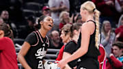 Indiana Hoosiers guard Chloe Moore-McNeil (22) celebrates with Indiana Hoosiers forward Faith Wiseman (31) on Thursday, March 6, 2025, during the Big Ten women's tournament at Gainbridge Fieldhouse in Indianapolis. Indiana Hoosiers defeated the Oregon Ducks, 78-62.