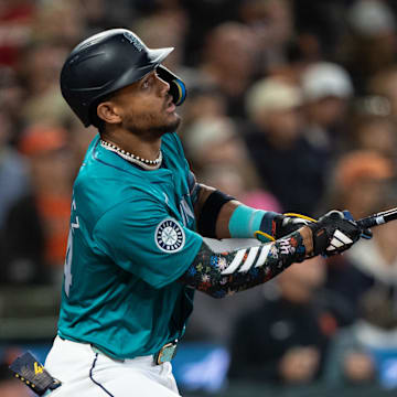 Seattle Mariners centerfielder Julio Rodriguez (44) hits a double during the seventh inning against the San Francisco Giants at T-Mobile Park on Aug 23.