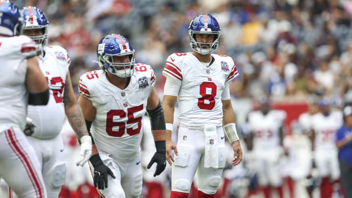 Aug 17, 2024; Houston, Texas, USA; New York Giants quarterback Daniel Jones (8) reacts after a play during the second quarter against the Houston Texans at NRG Stadium.  