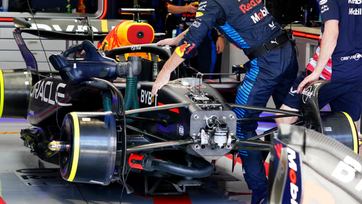 May 4, 2024; Miami Gardens, Florida, USA; Crewmembers work on the Red Bull Racing driver Max Verstappen (1) car in the paddock before the F1 Sprint Race at Miami International Autodrome. Mandatory Credit: John David Mercer-USA TODAY Sports